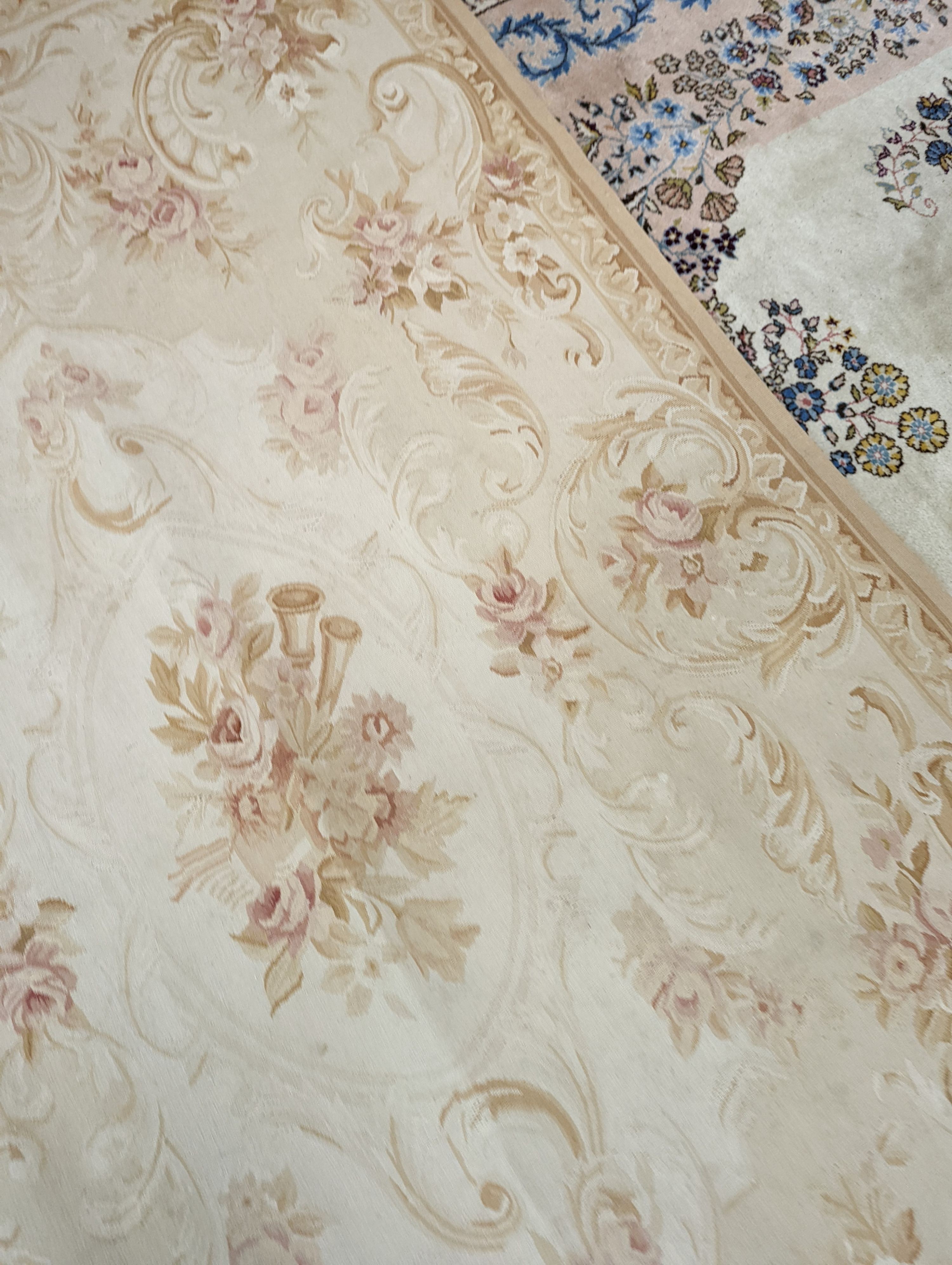 An Aubusson gold ground rug with rose pattern, 244 x 153cm